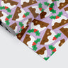 Christmas wrapping paper with christmas pudding pattern on it